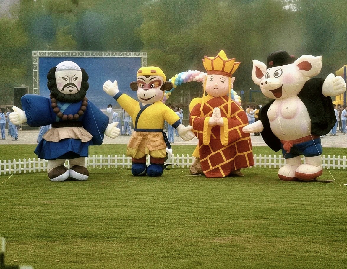 Four inflatable Journey to the West characters at a children's park event