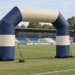 Sports team inflatables with a separate mascot display and run-out arch at a sports ground