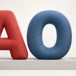 AI concept of inflatable A, O and i study shapes showing open interiors, gaps and a conceptually separated dot.